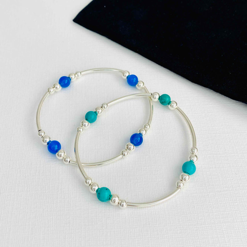 Sterling silver bracelet with turquoise gemstone beads and sterling silver bracelet with blue onyx gemstone beads. Everyday Jewellery. KookyTwo Stacking Bracelets.