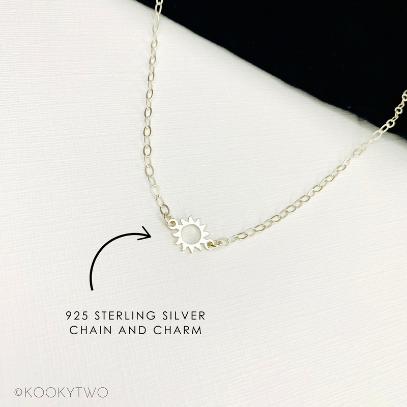 Sterling silver sun charm necklace. KookyTwo.