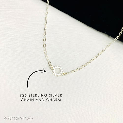 Sterling silver sun charm necklace. KookyTwo.