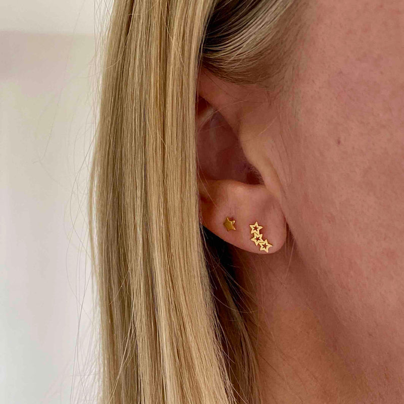 Gold trio star stud earrings for everyday styling. KookyTwo.