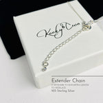 Adjustable silver chain with 2' extension chain attached. KookTwo.