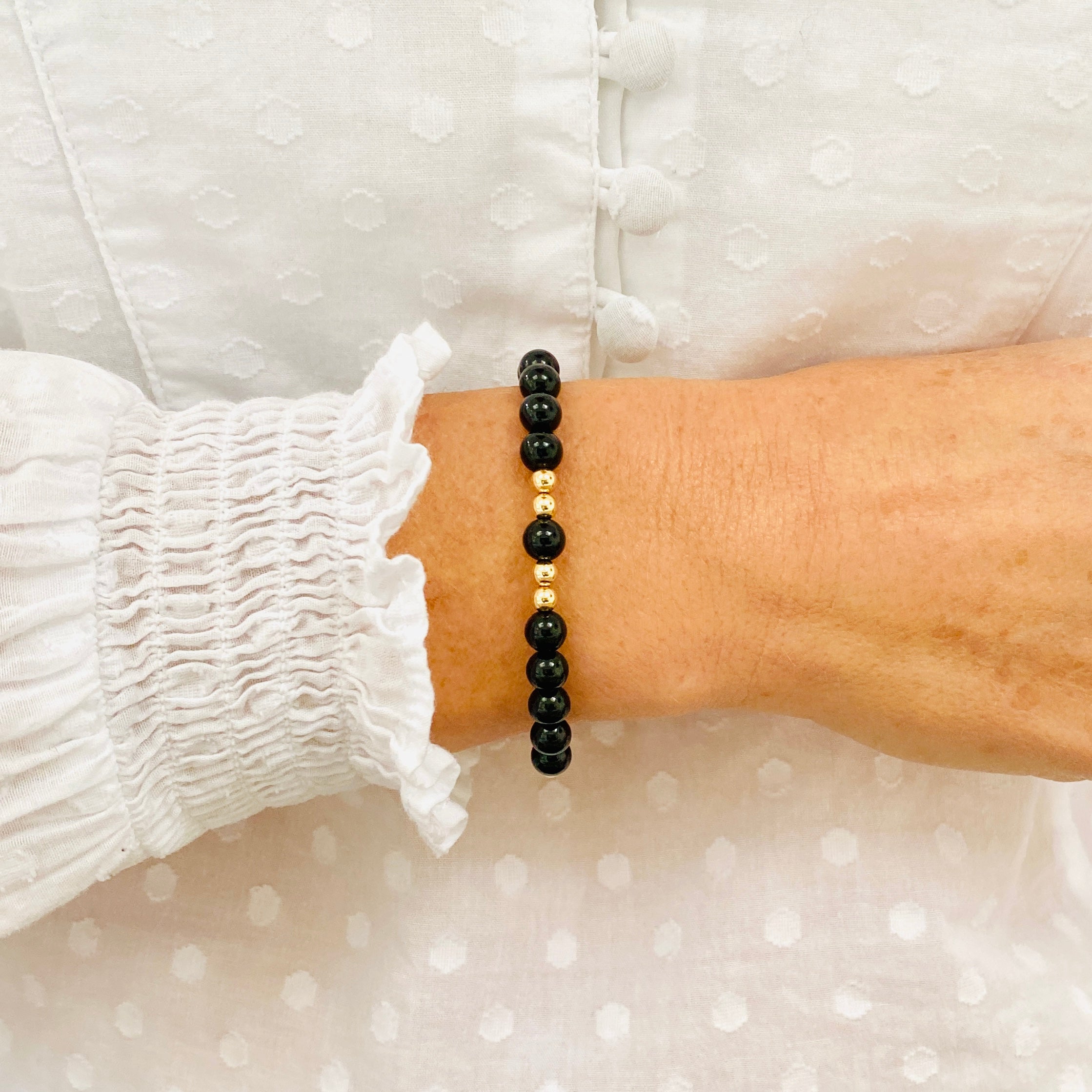 Black Onyx Bracelet with Gold Plated offers Accents