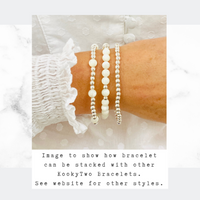 Mother of pearl bracelet stack.