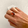 Amber gemstone ring ins sterling silver with adjustable band. KookyTwo