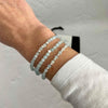 Gemstone bracelet set with aquamarine beads and silver beads. March bracelet gift for her. KookyTwo Jewellery.