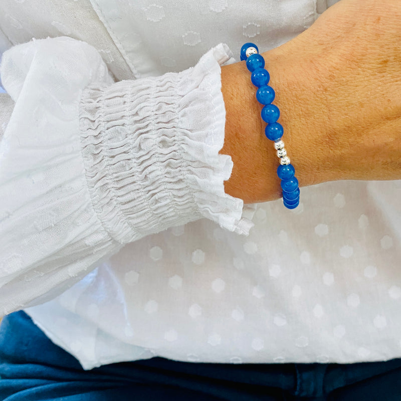 Vibrant blue onyx gemstone bracelet. Handbead gemstone bracelet. Sterling silver gemstone bracelet. Silver and blue bracelet. Silver and blue gemstone bracelet.
