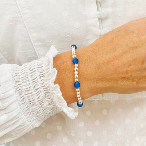 Blue bead bracelet with sterling silver beads and blue onyx gemstone beads.