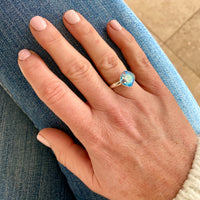 Shimmering light sapphire crystal ring featuring sparkly Swarovski elements crystal in light blue, set in sterling silver adjustable ring.