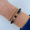 Gold bead bracelet set of two bracelets in all gold and snowflake obsidian gemstones.