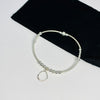 Sterling silver bead bracelet with silver hammered circle charm.