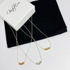 Dainty silver necklaces with a choice of shiny delicate beads in silver, gold and rose gold. Kooky Two.