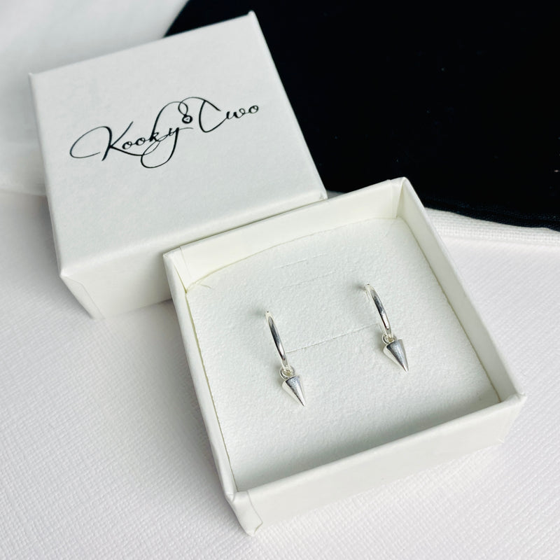 Silver mini hoop earrings with drop charms. KookyTwo Jewellery.