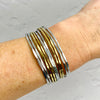 Mixed metal silver and gold bracelet. Boho style bracelet with a chunky design and adjustable fit. KookyTwo.