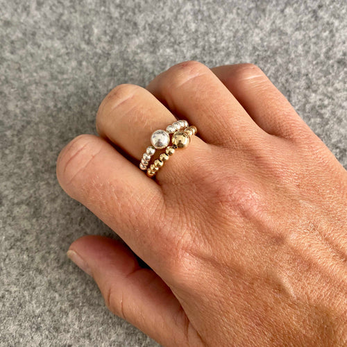 Sterling silver ring and 14k gold filled ring handmade with beads on strong jewellery elastic. KookyTwo Jewellery handmade in Hampshire.