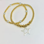 Star charm bracelet with gold beads and silver beads. Ladies bracelet accessory.