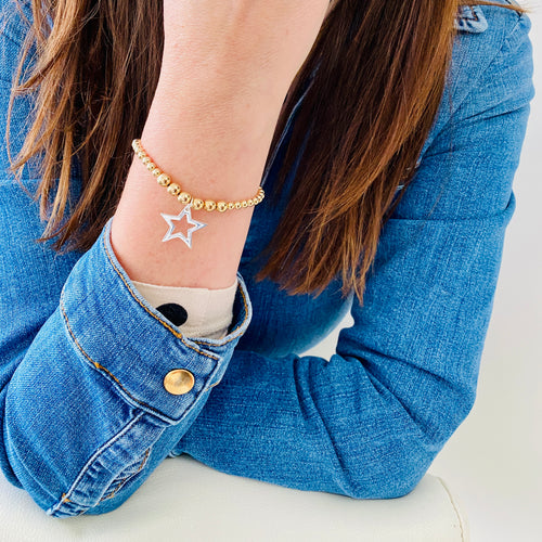 14k gold filled bead bracelet with sterling silver star charm. 