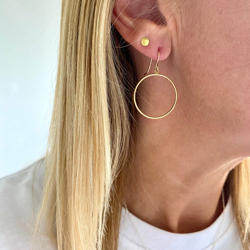 Gold drop earrings with circle charm