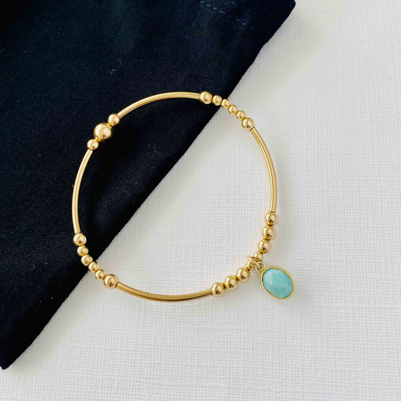 Larimar gemstone bracelet with 14k gold filled beads a Larimar charm. KookyTwo.