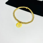 Gold leaf bracelet. Bracelet with gold leaf charm.
