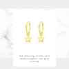 Gold hoop earrings with gold stars