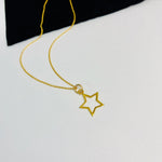 Star charm on necklace in gold. Star pendant necklace in 14k gold filled. Kooky Two.