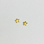 Gold Star Stud Earrings. Mini gold star stud earrings.