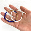Lapis lazuli and 14k gold filled bead bracelet. Mother of pearl and sterling silver bead bracelet.