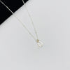Letter necklace with two silver initial charms on chain. KookyTwo