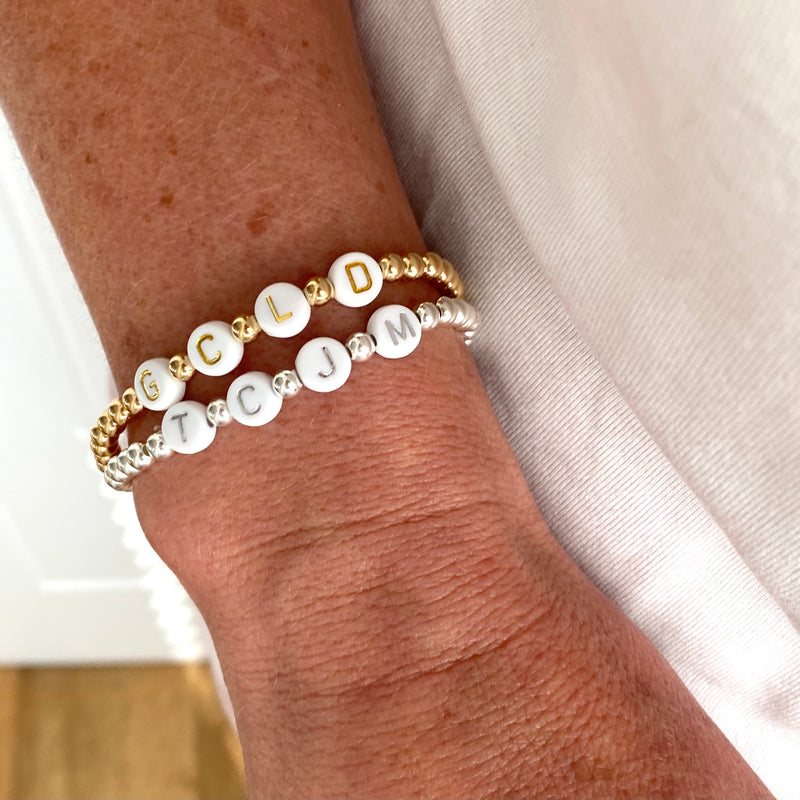 Acrylic letter bead bracelets with sterling silver beads and 14k gold filled beads to be customised with letters of your choice. KookyTwo.