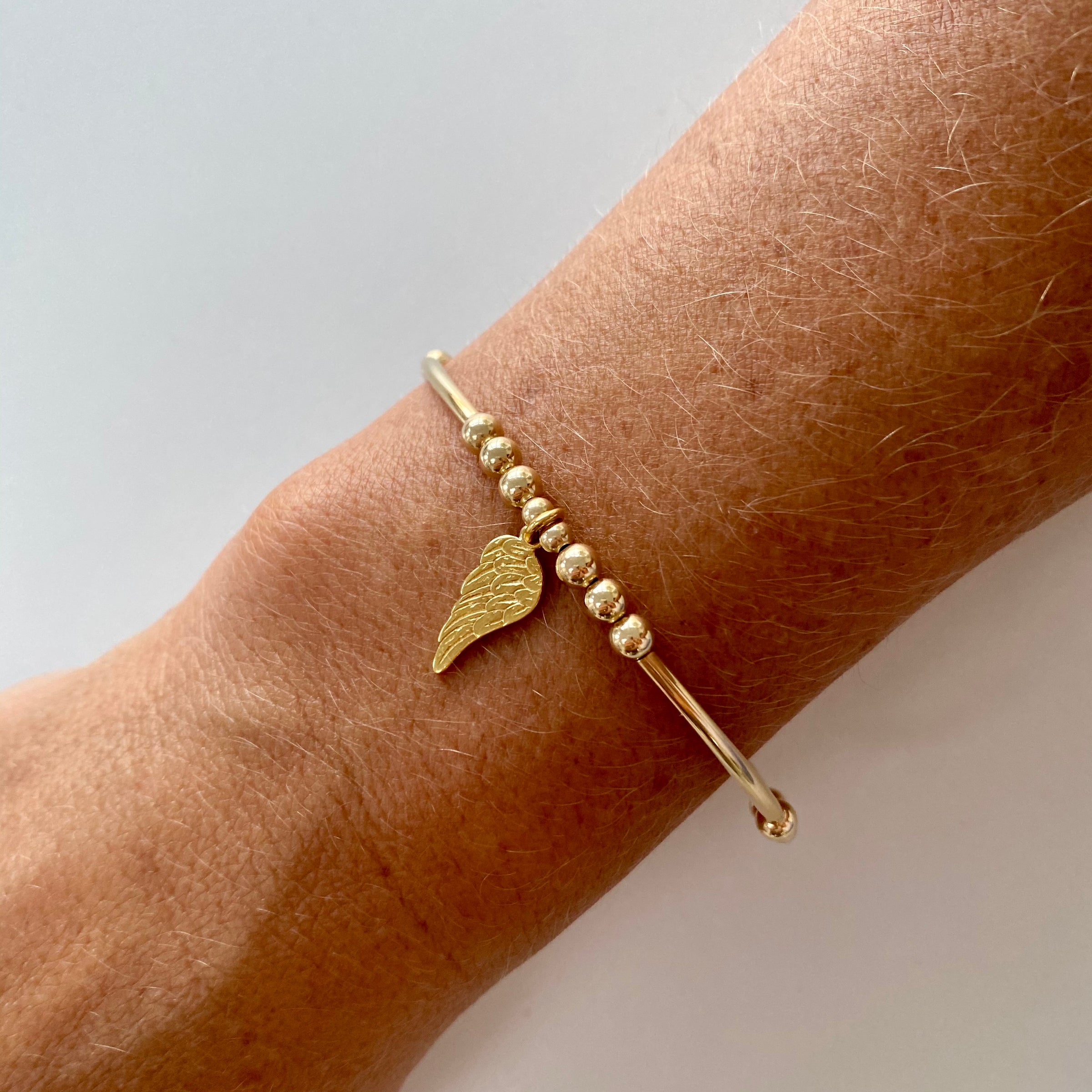 Dime & Angel Wing Bracelet – Lets Accessorize