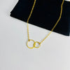 gold double ring necklace with interlocking rings. KookyTwo.