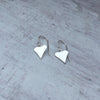 Silver earrings with silver heart charms. Everyday earrings with hearts. KookyTwo