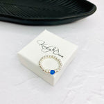 Stretch ring with sterling silver beads and blue onyx beads, easy to roll on and off.
