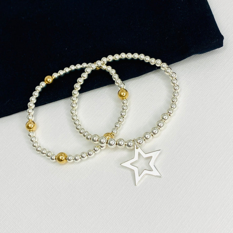 KookyTwo two bracelet set with sterling silver beads,  star charm and an accent of gold beads.