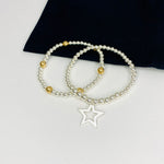 Handmade bracelets with sterling silver beads, sterling silver star charm and gold beads.