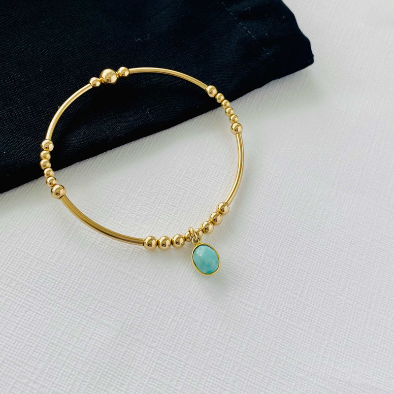 Gold bead bracelet with Larimar gemstone charm. KookyTwo.