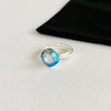 Blue crystal cocktail ring with sterling silver ring.