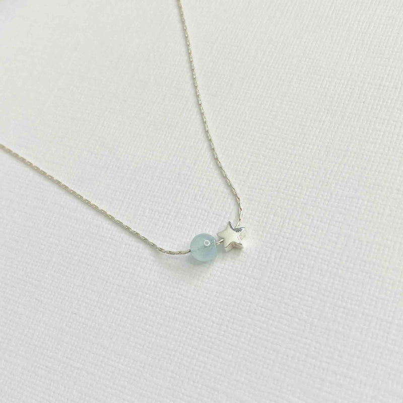 Silver necklace with aquamarine gemstone bead and star bead. Handmade necklace in sterling silver with beads. KookyTwo.