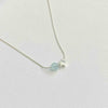 Silver necklace with aquamarine gemstone bead and star bead. Handmade necklace in sterling silver with beads. KookyTwo.