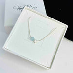 March necklace gift in pretty white box. KookyTwo.
