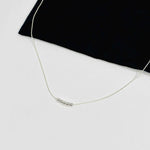Dainty silver chain with silver beads. Personalise the number of shiny silver beads with meaning. KookyTwo.