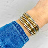 Silver and gold slim band cuff bangle. Adjustable bracelet in a cuff style perfect for summer styling. Kookytwo.