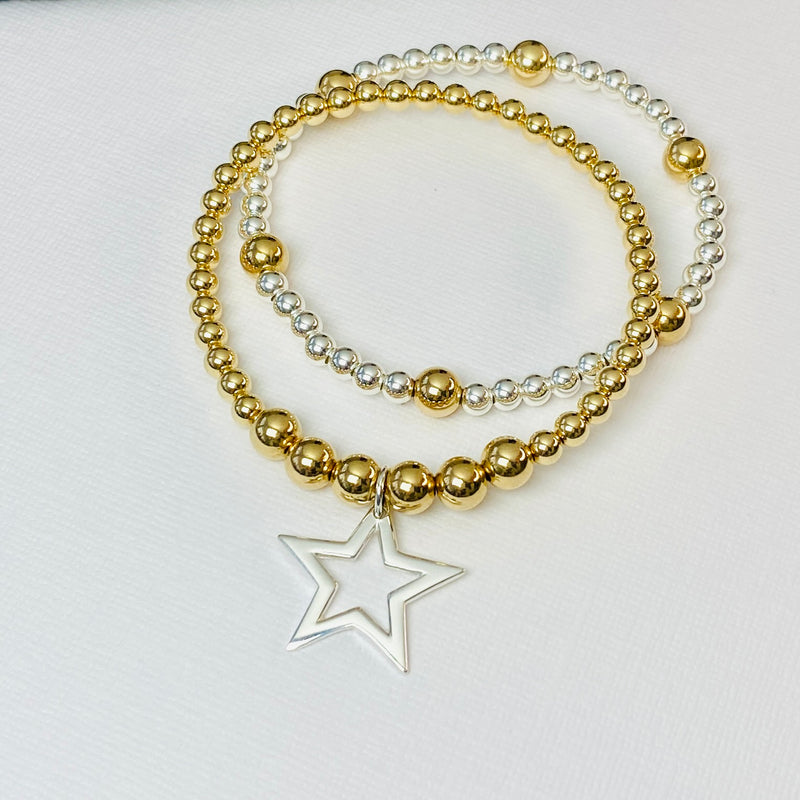 Stacking bracelet set for ladies with gold beads and silver beads. Ladies accessories with star charm.