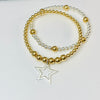 Stacking bracelet set for ladies with gold beads and silver beads. Ladies accessories with star charm.