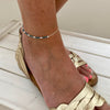 Green bead anklet with dainty beads for summer styling. KookyTwo.
