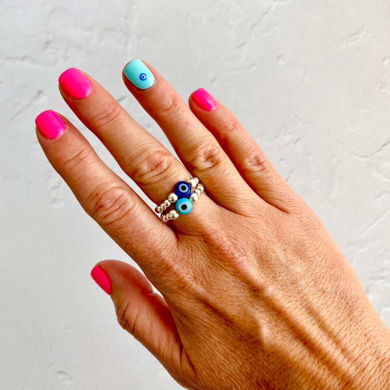 Evil eye bead ring with sterling silver beads and vibrant blue evil eye bead or turquoise evil eye bead. KookyTwo.