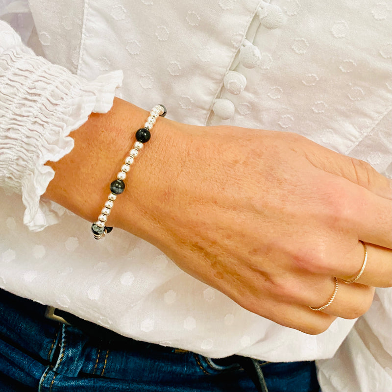 Sterling silver bead bracelet with snowflake obsidian beads. Gemstone jewellery.