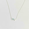 Pretty blue bead necklace with aquamarine gemstone on silver chain. KookyTwo.