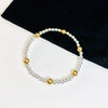 Pretty mixed metal bracelet with sterling silver and 14k gold filled beads.