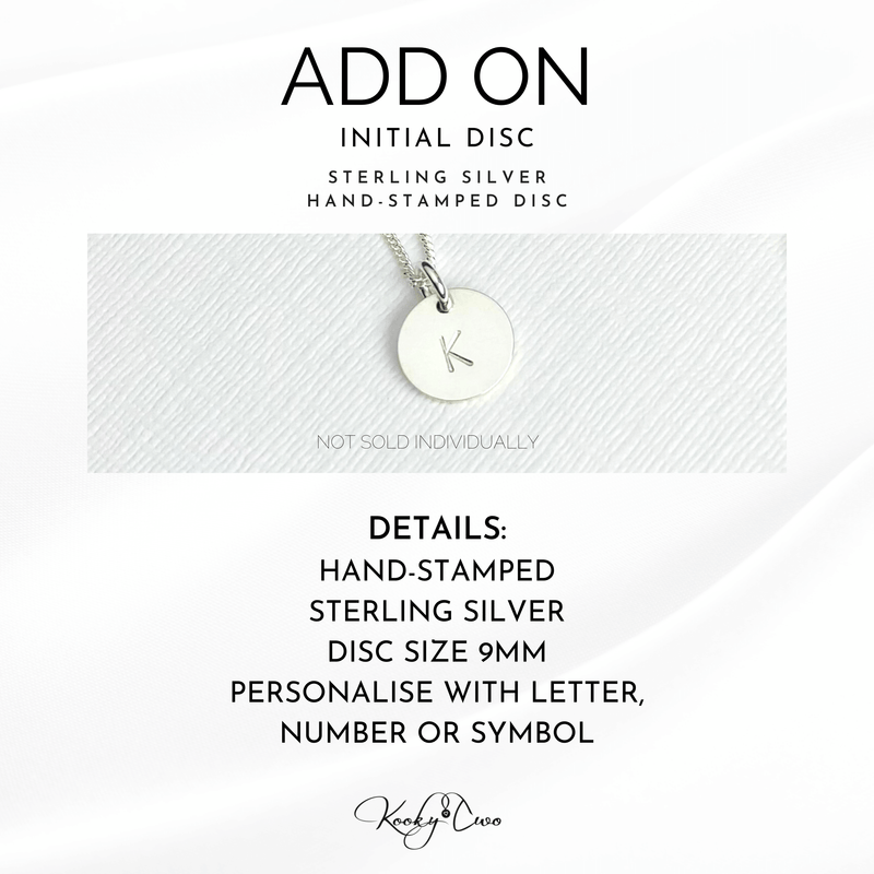Add on personalised disc charm with initial hand-stamped on sterling silver disc for necklace or bracelet.